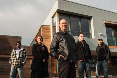 Environmental Portraits of Corporate Team before house on the Sc