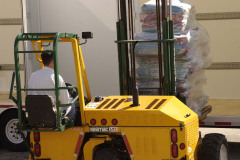 Fork Lift Loading Transport Truck as Photographed for Storage St