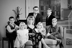 Formal in home Family Portrait of couple with five young childre