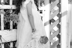 Black & White Outdoor Portrait of young girl wearing a white lac